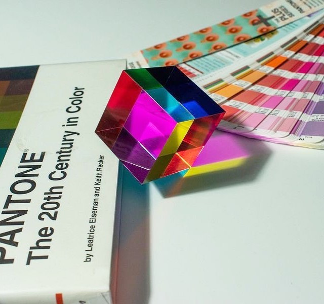 A CMY Cube from The Original Pack held up to the light