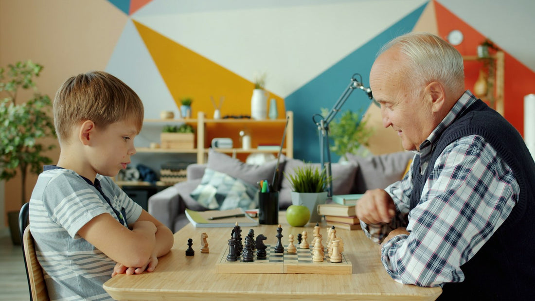 Grandfather and grandson playing chess, a board game full of surprising word origins