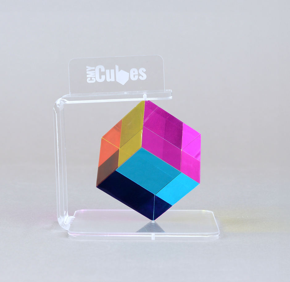 The GyroStand holding a CMY Cube ready to spin